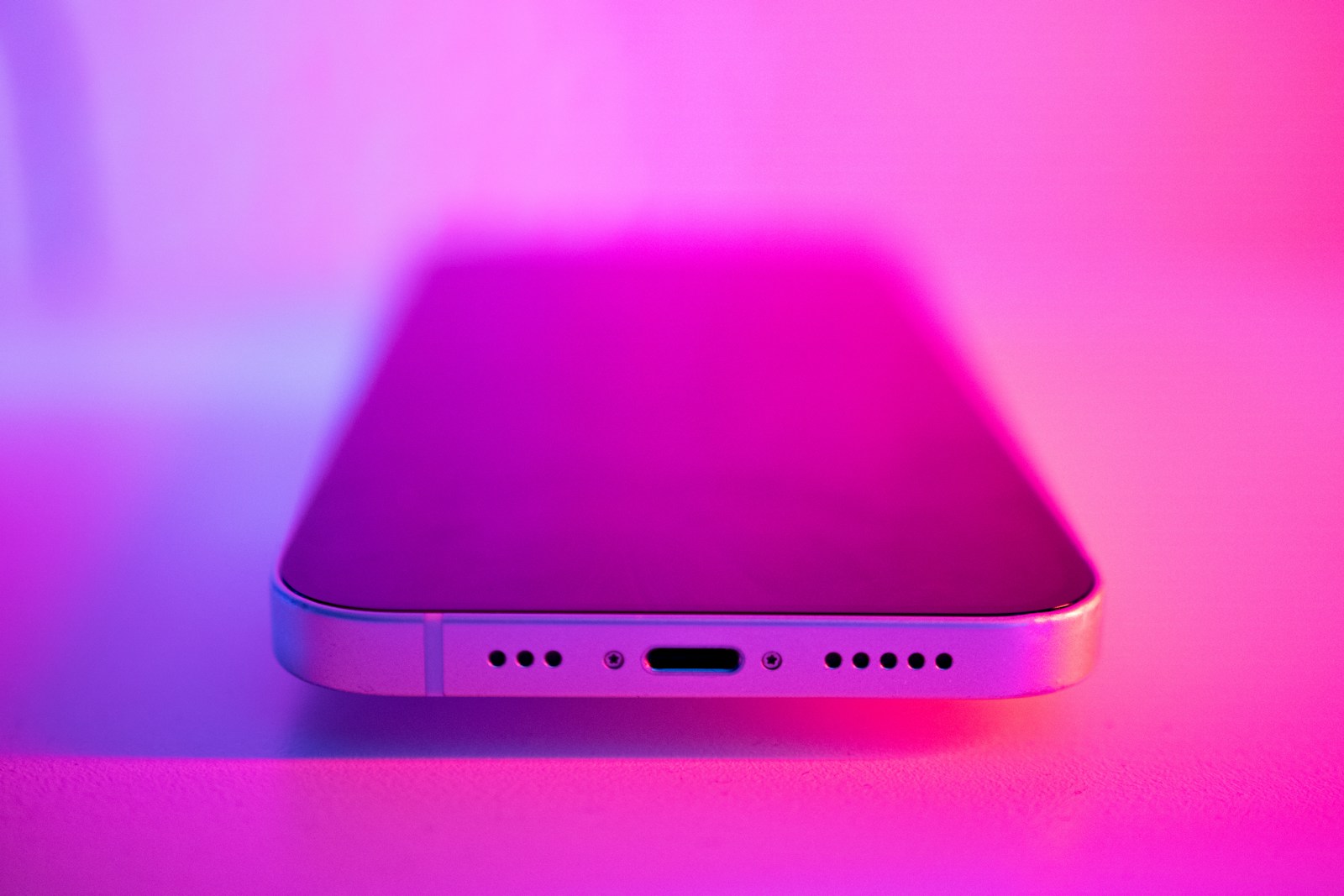 a close up of a cell phone on a table