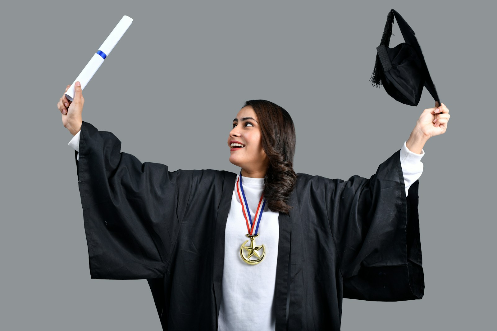 a person holding a diploma