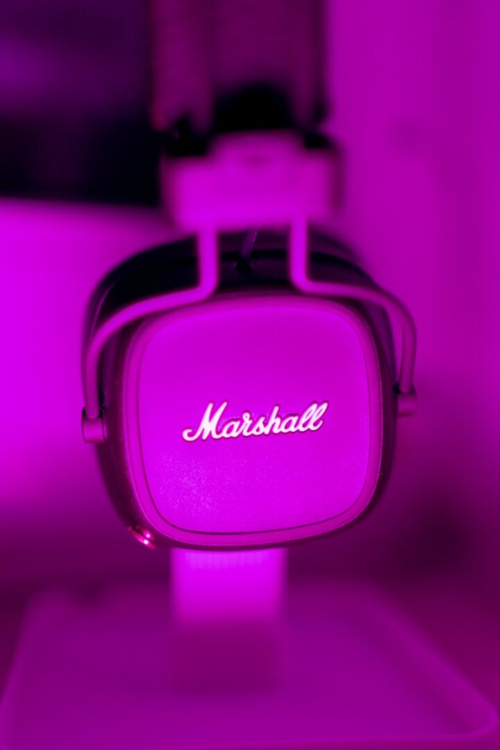 a close up of a purple light with a name on it